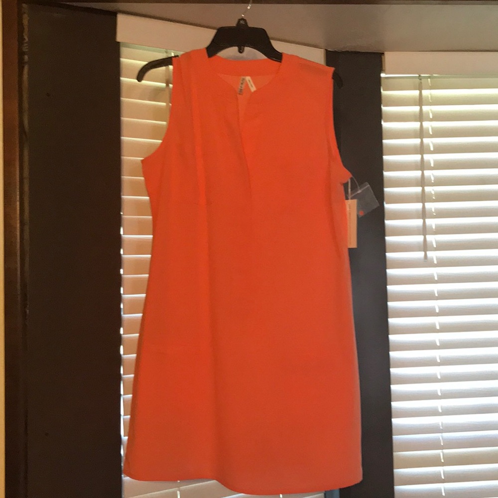 Large orange dress or swim suit cover